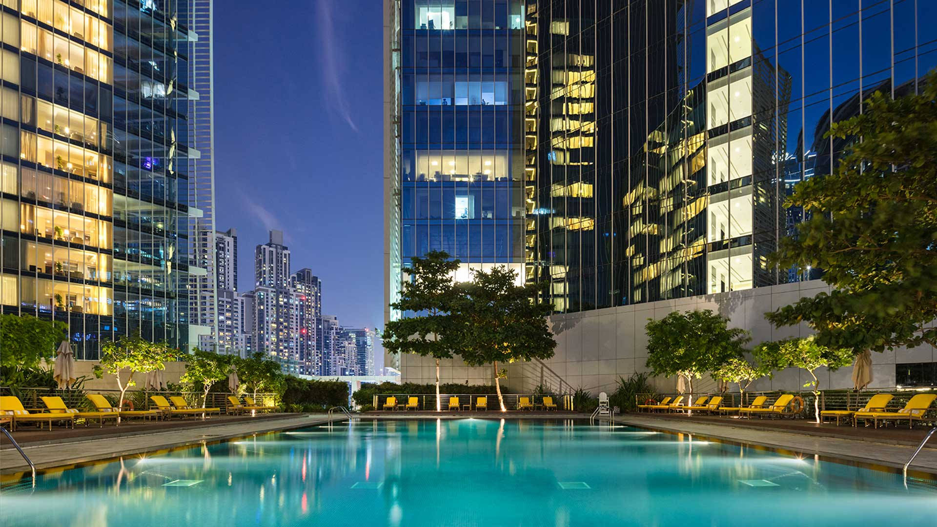 Pool In Downtown Dubai At Night Background