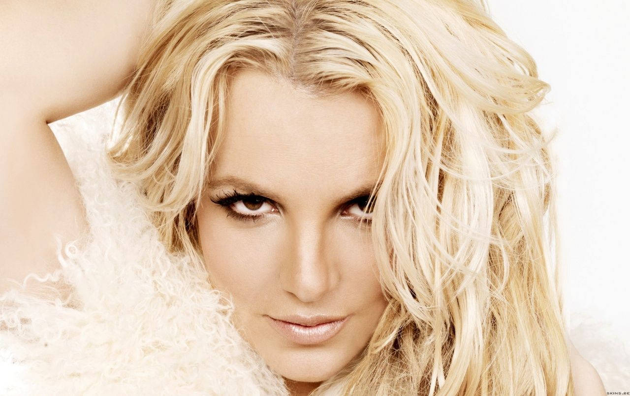 Pop Icon Britney Spears On The Femme Fatale World Tour Background