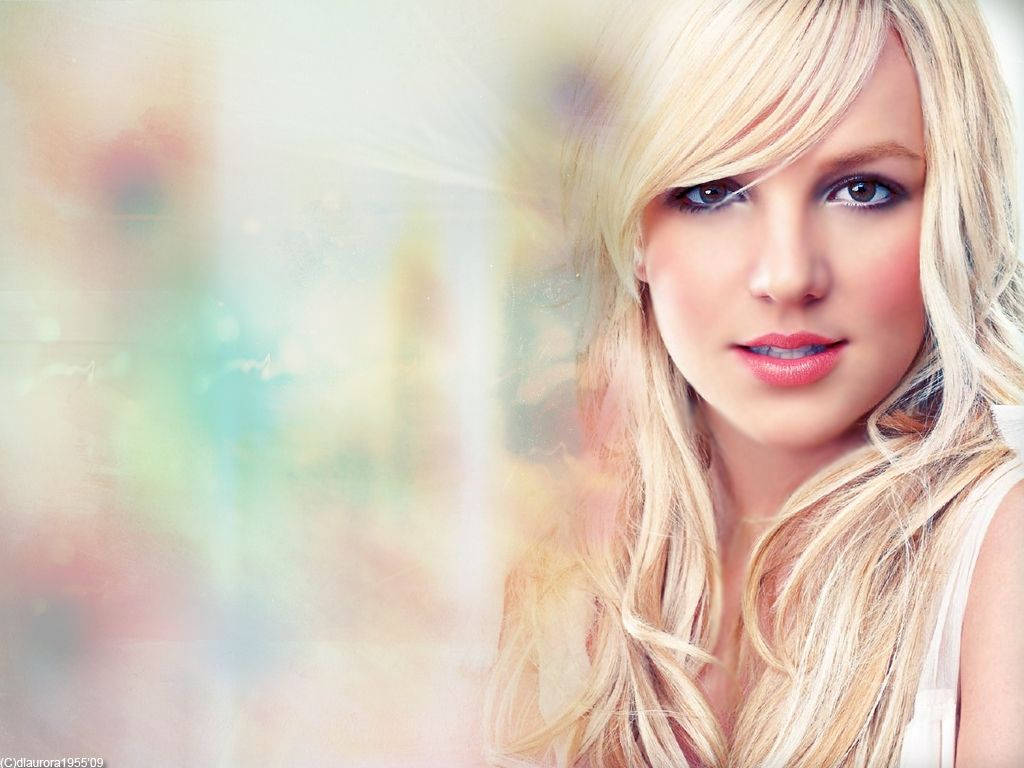 Pop Star Britney Spears Looks Vibrant And Colorful Background