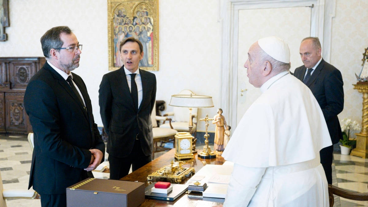 Pope Francis Addressing The Public In Vatican City Background