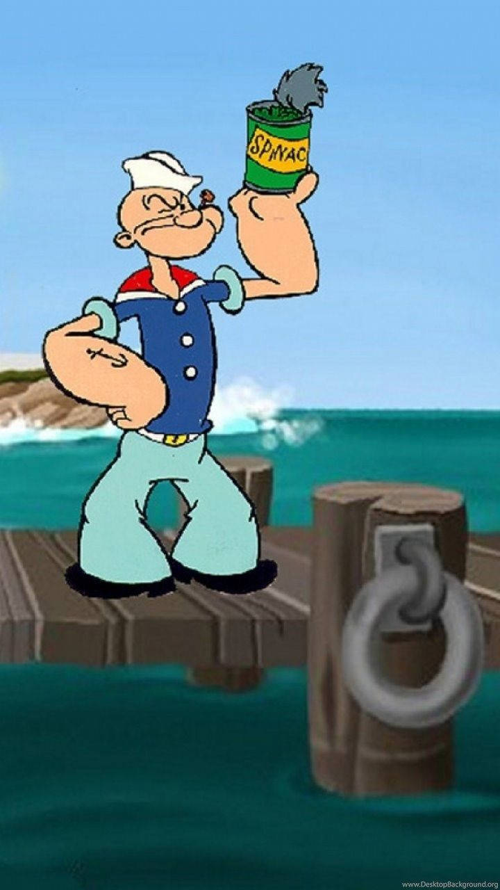 Popeye Holding Spinach By The Sea Background