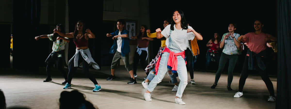 Popping Group Dancing Together [wallpaper] Background