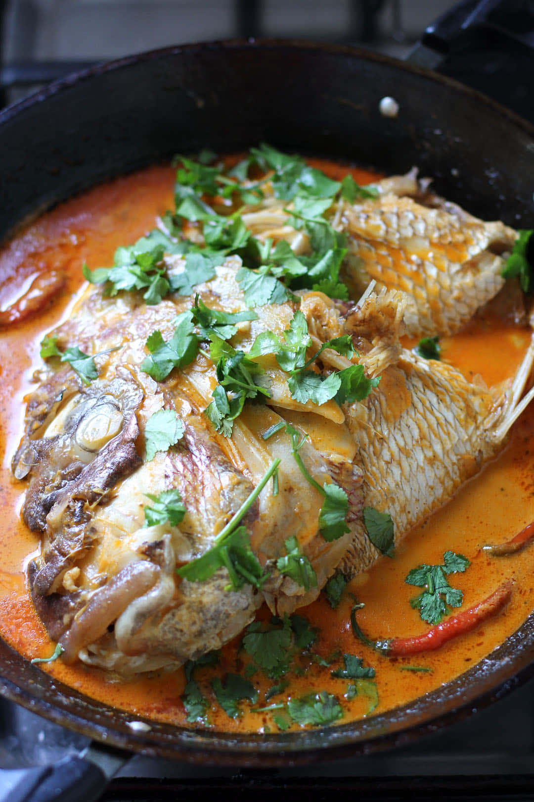 Popular Singaporean And Malaysian Dish Fish Head Curry Background