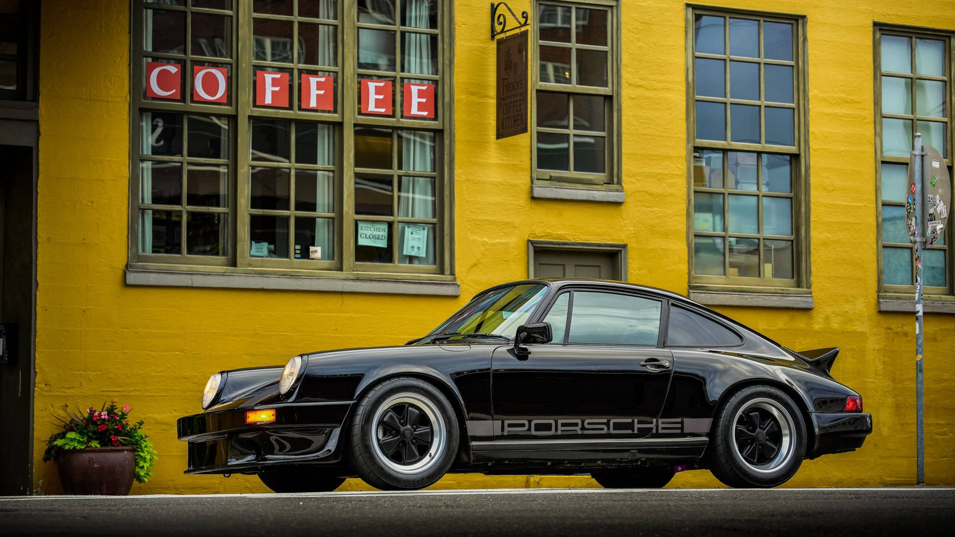 Porsche 911 And Coffee House Background
