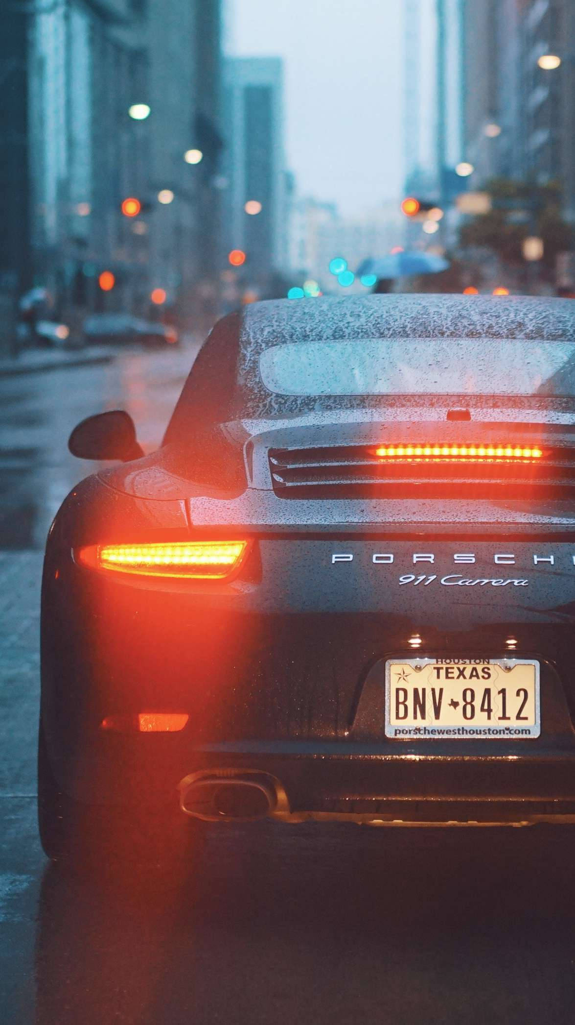 Porsche 911 Driving In The Rain Background