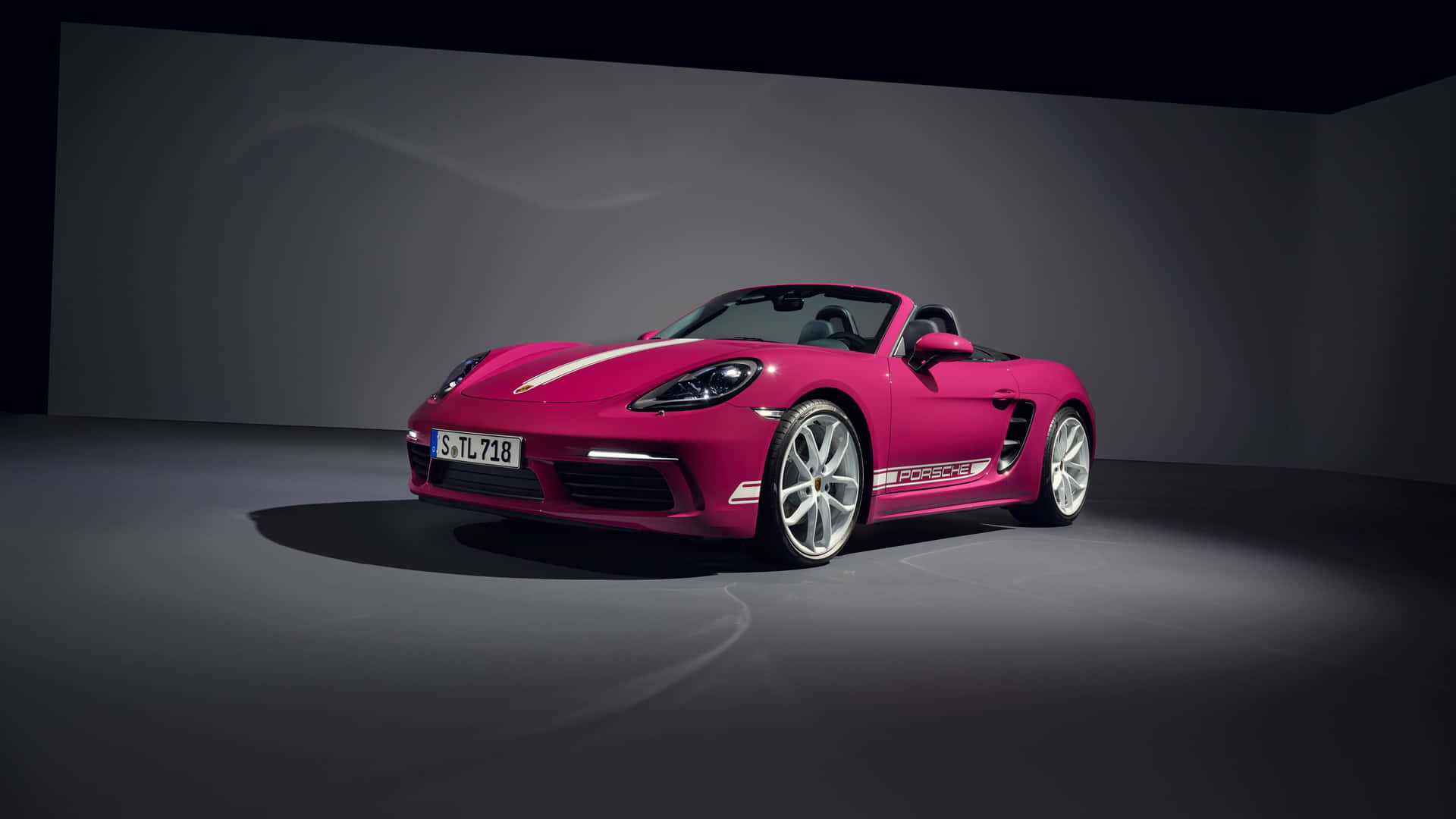 Porsche Boxster - Pink Sports Car In A Dark Room Background