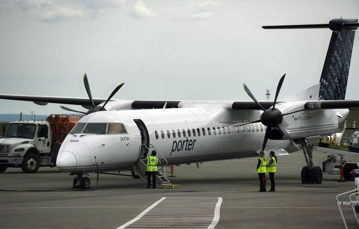 Porter Airlines Crew In Uniform Background