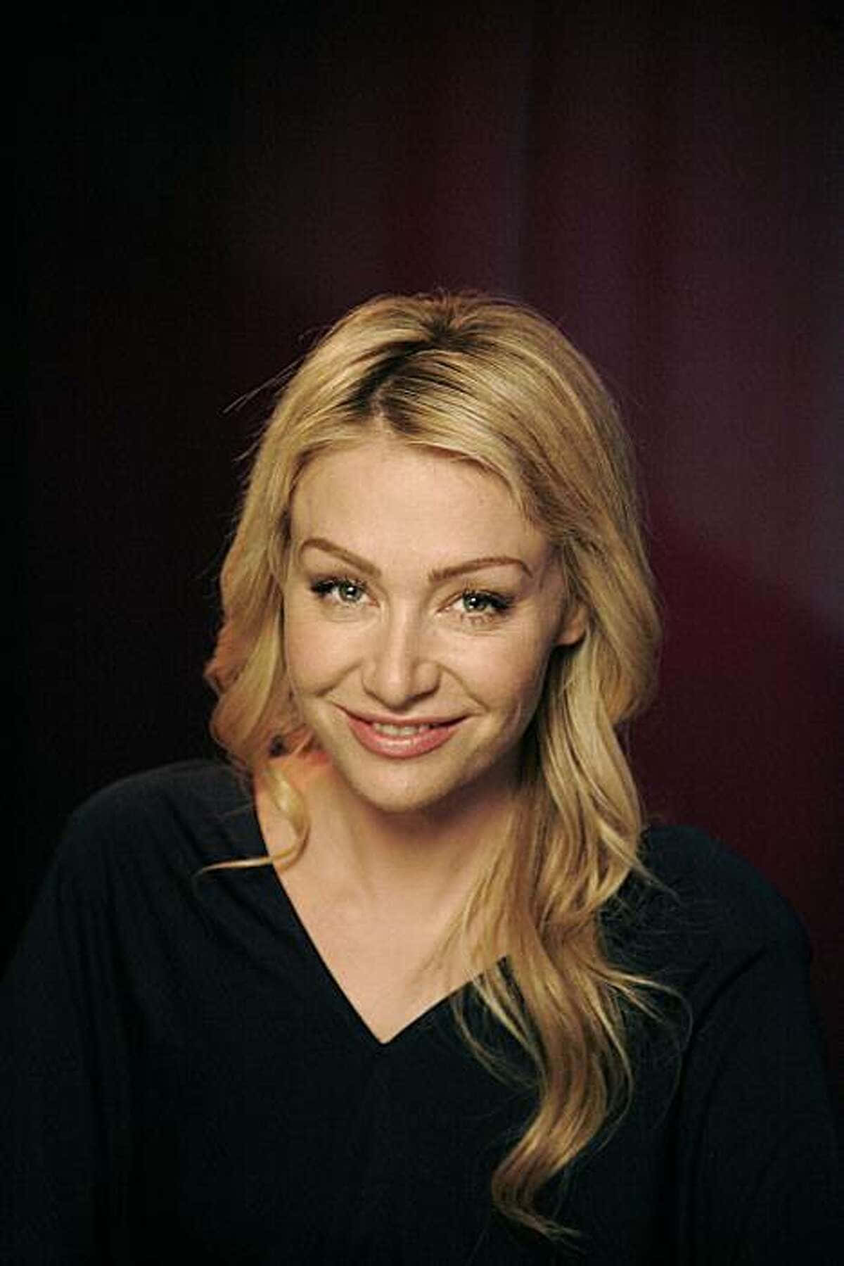 Portia De Rossi Smiling Portrait Background