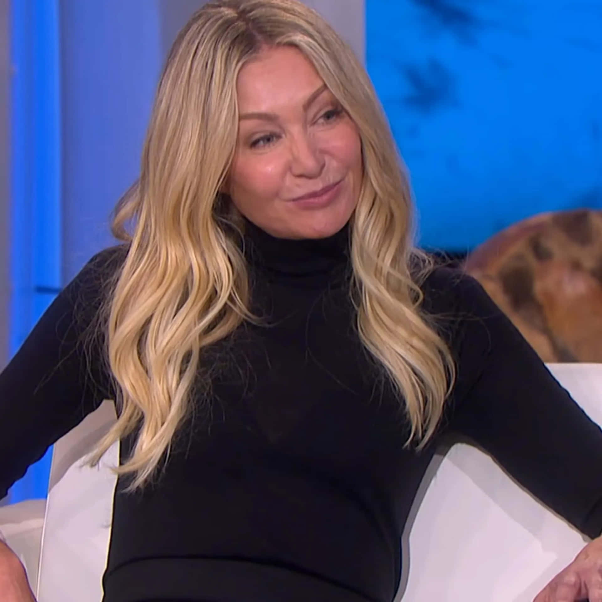 Portia De Rossi Smilingin Black Turtleneck