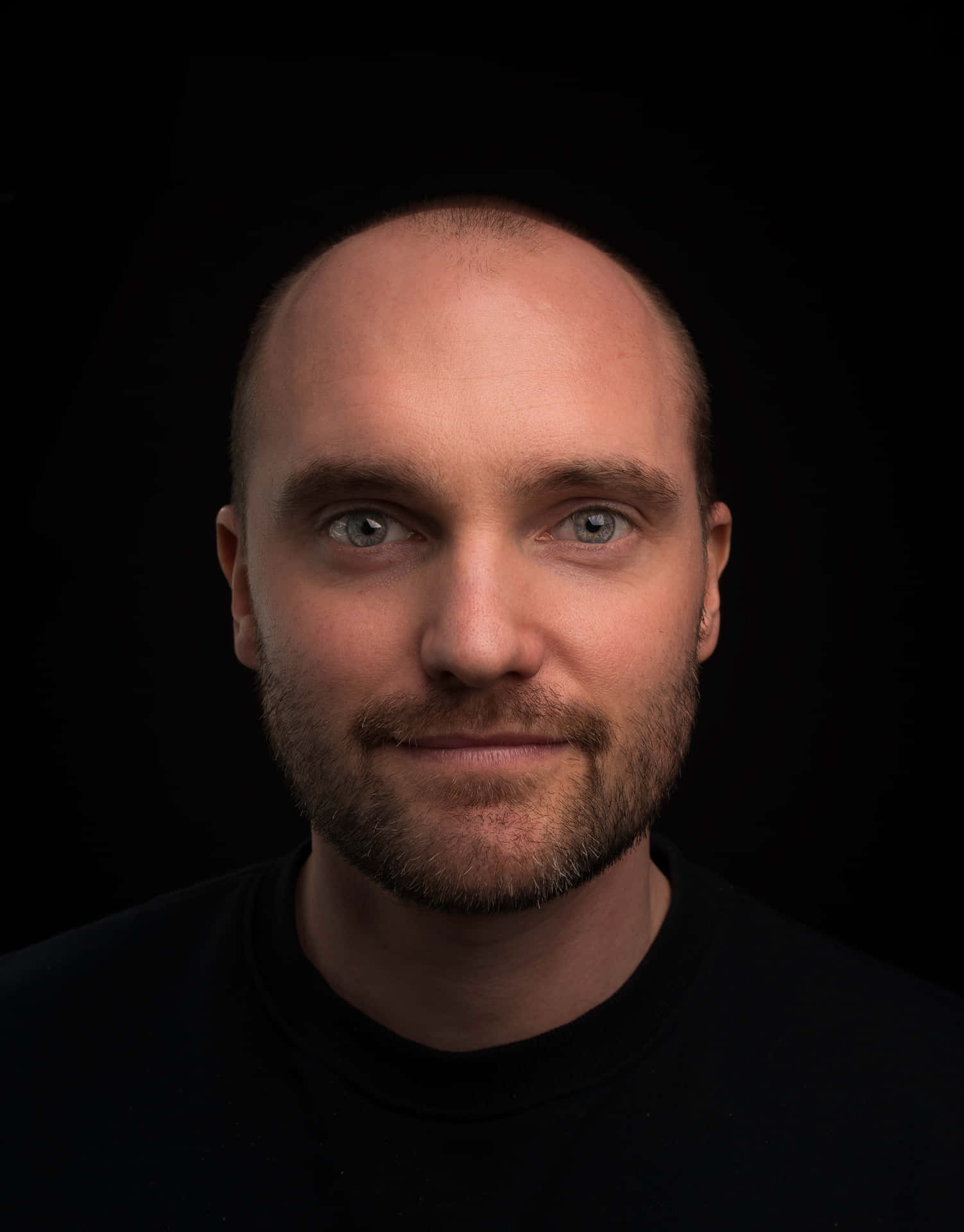 Portrait Of A Bald Man Smiling