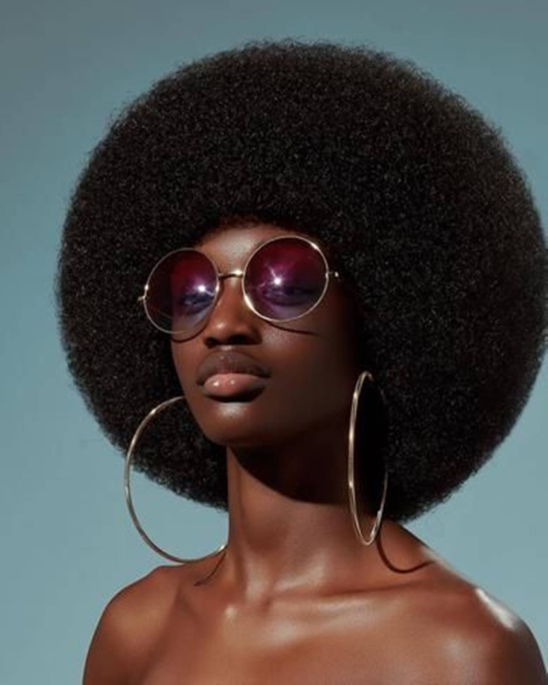 Portrait Of A Beautiful Black Woman With Clean Haircut Background