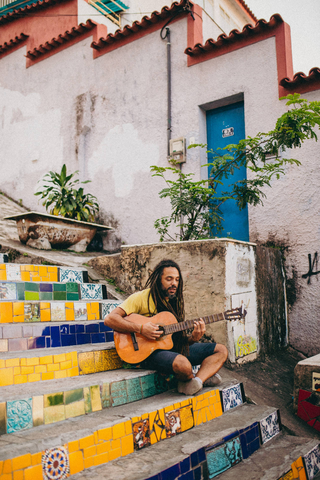 Portrait Of A Long-haired Mexican Man Background