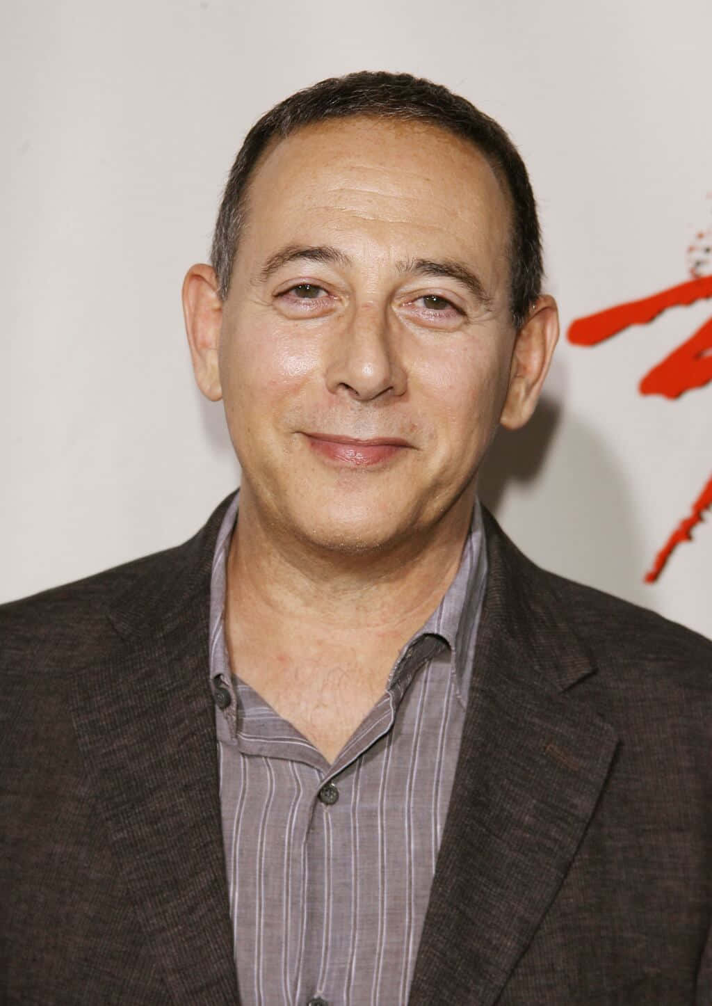 Portrait Of Actor Paul Reubens In His Famous Character Pee-wee Herman Background