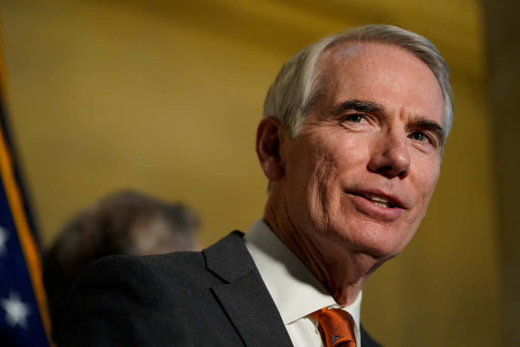 Portrait Of Rob Portman Against The Sky Background