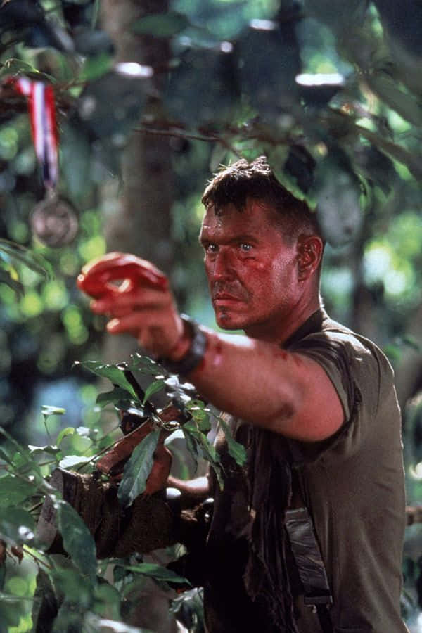 Portrait Of Tom Berenger In A Thoughtful Pose Background