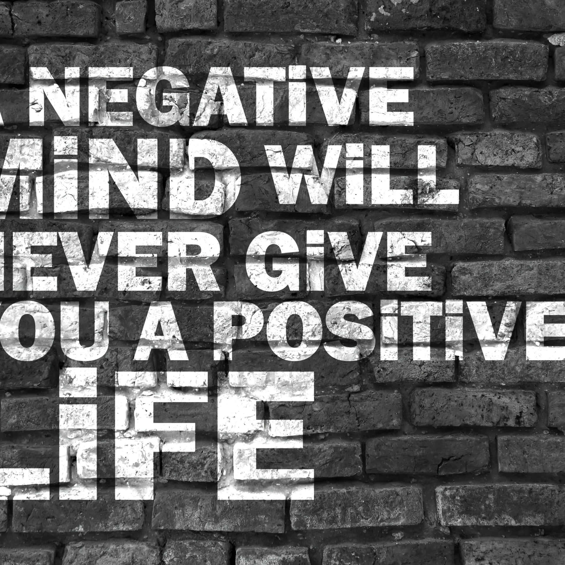 Positive Mindset Inspirational Quoteon Brick Wall Background
