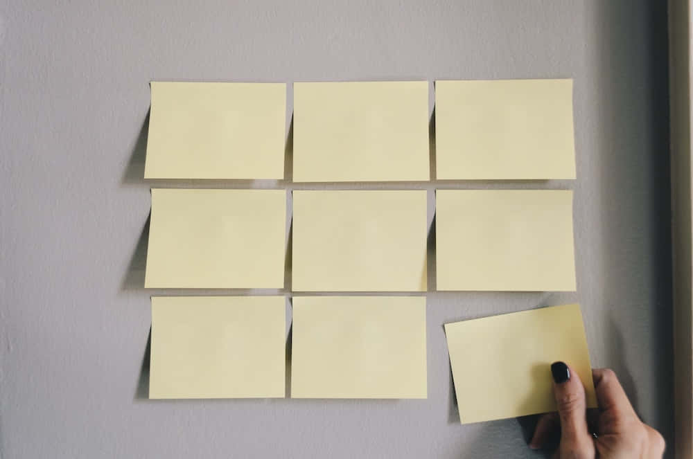 Postit Noteson Wall Organization Concept Background