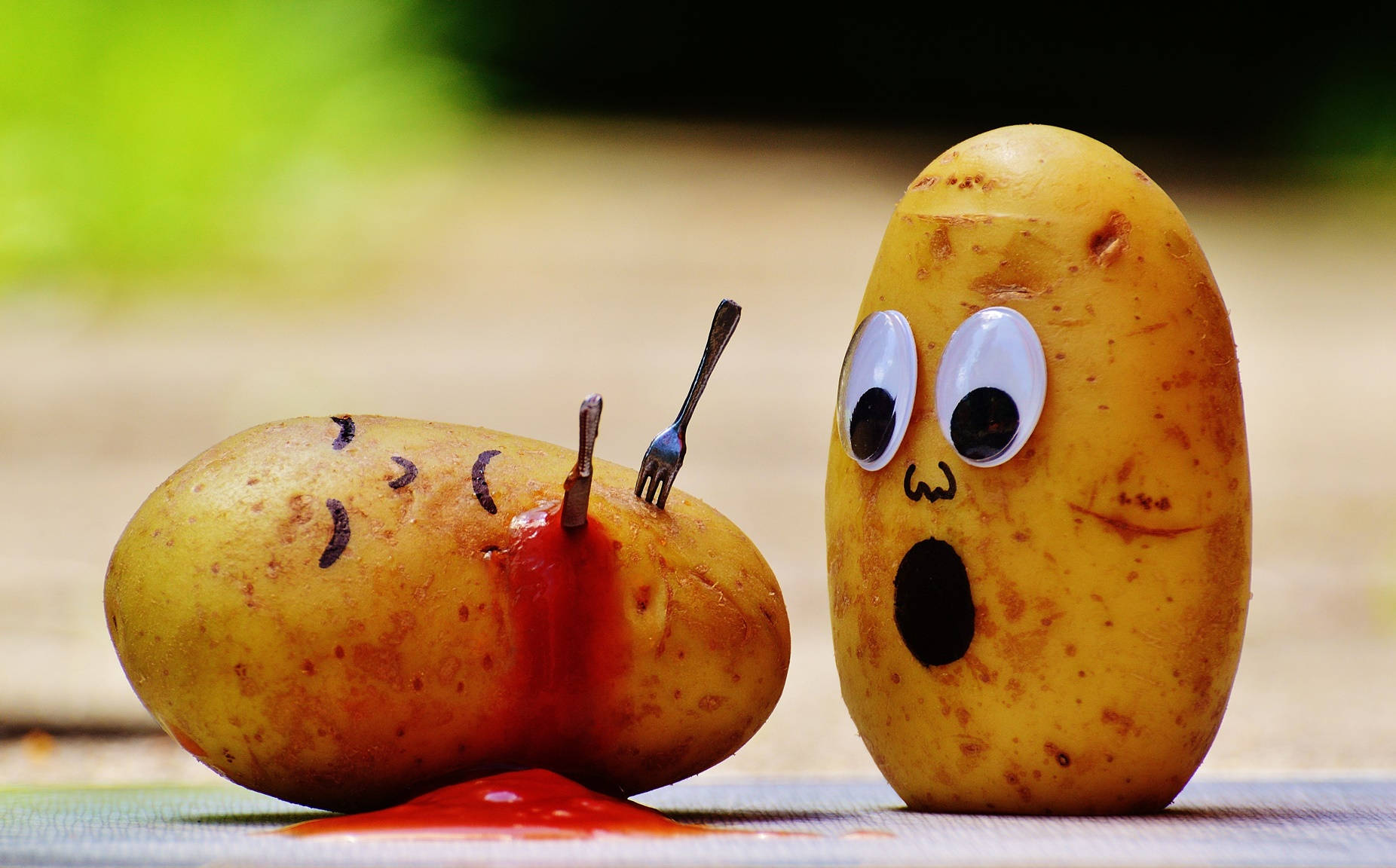 Potatoes With Doodled Human Features Background