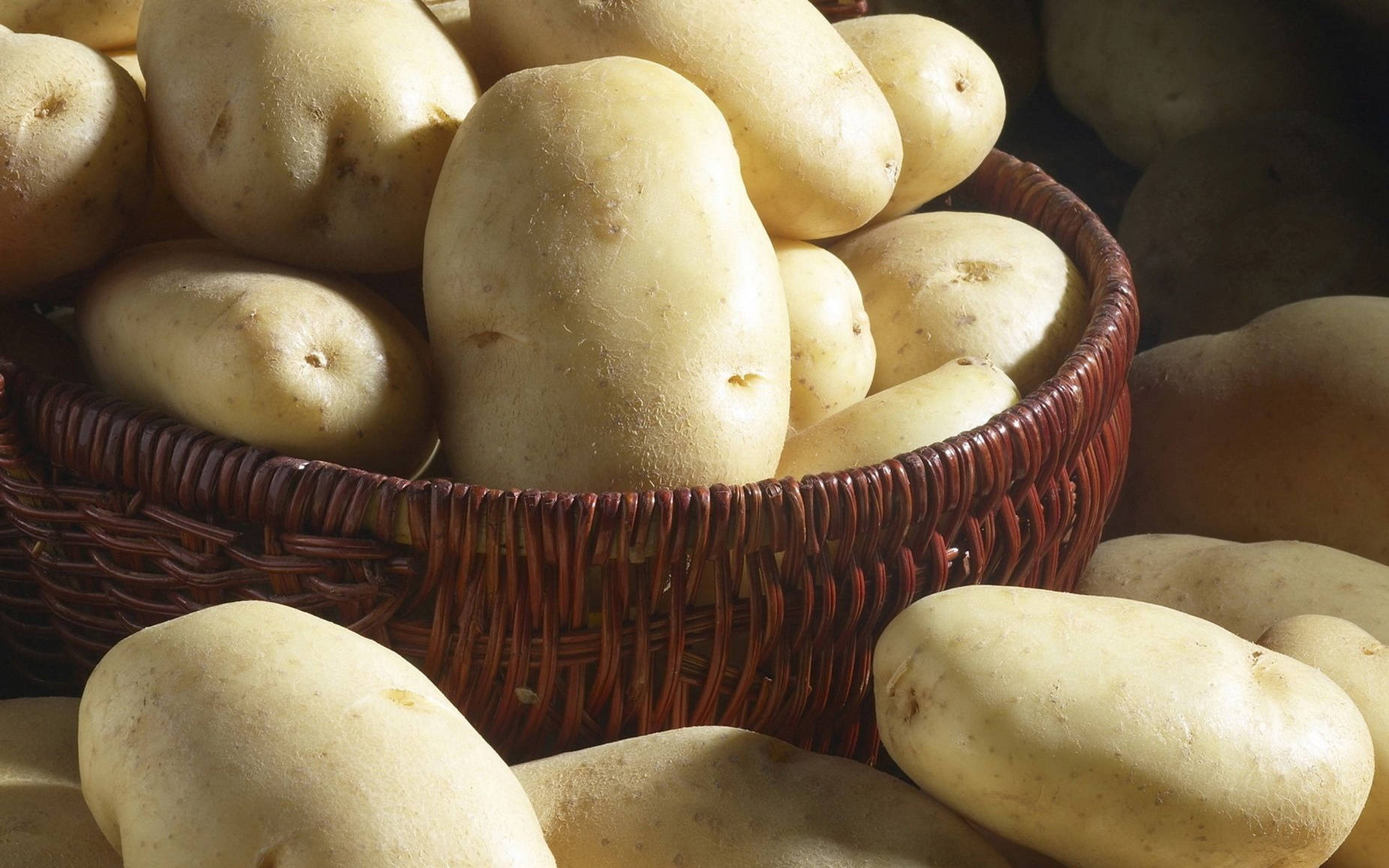 Potatoes With White Skins Background