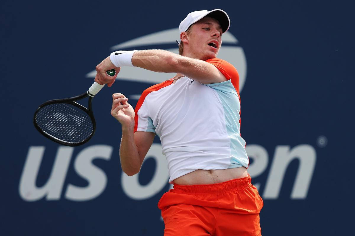 Potent Tennis Player Denis Shapovalov Competing At The Us Open Background