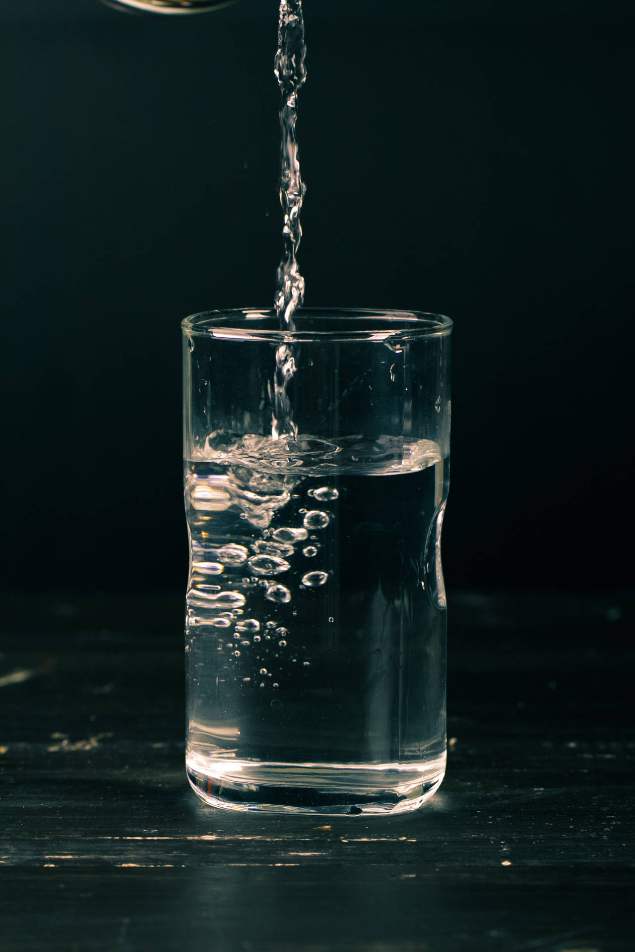 Pouring Liquid Into Glass Background