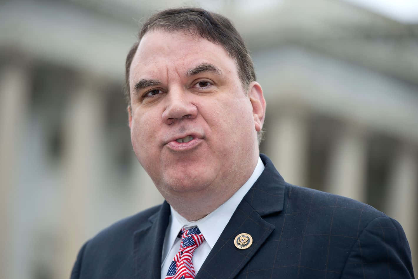 Pouty Lips Alan Grayson Background