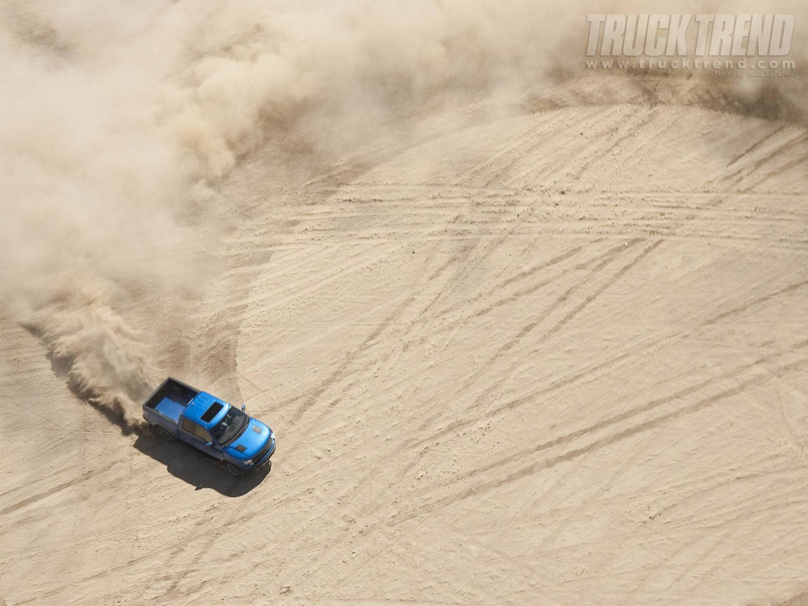 Power And Performance: The Ford Raptor In Drift Background