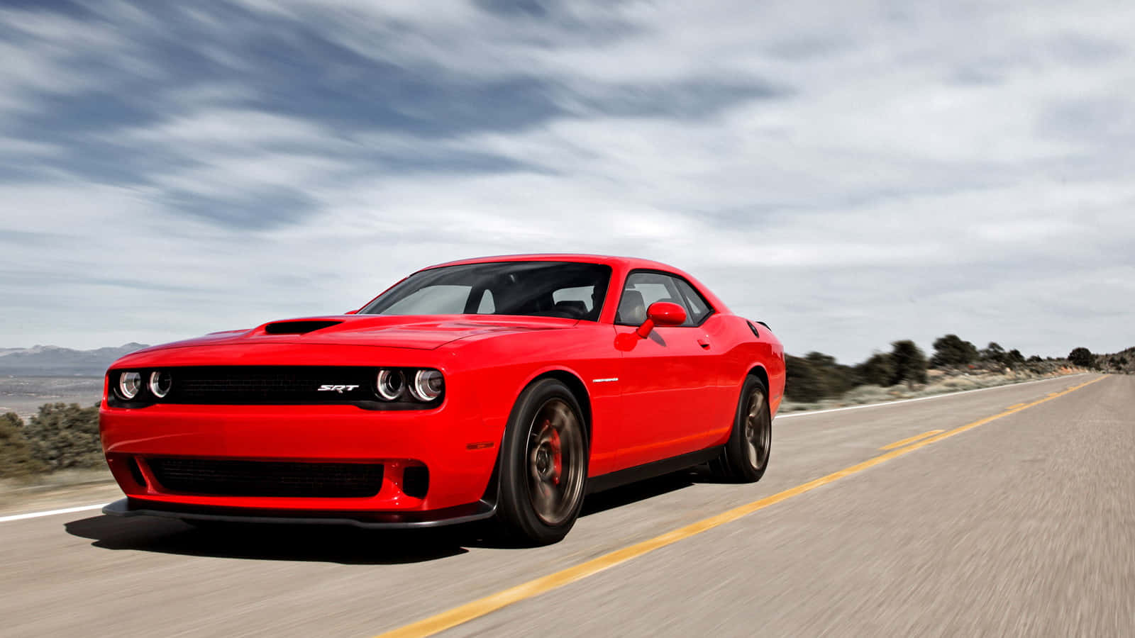 Power And Speed - Red Dodge Hellcat In The Spotlight Background