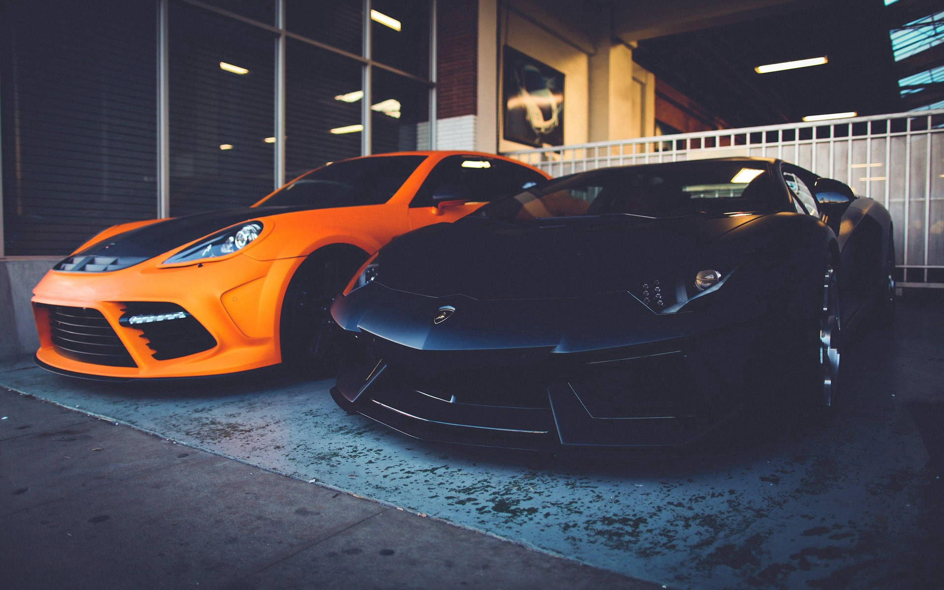 Power And Style - Two Luxury Lamborghinis Background