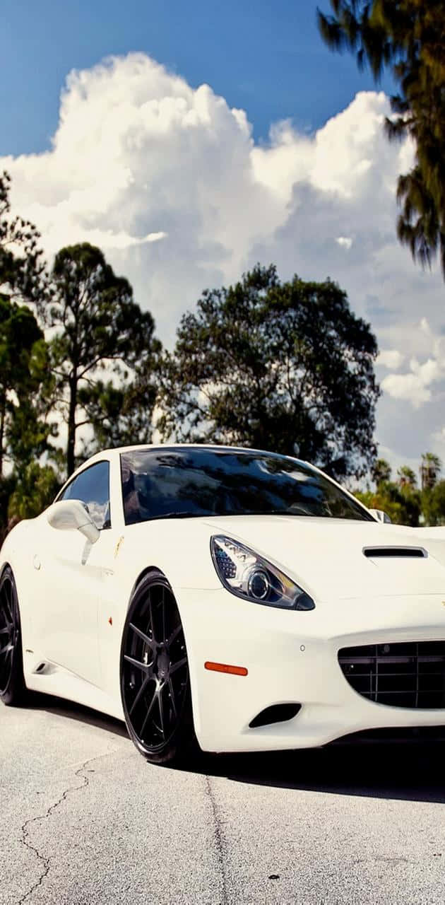 Power, Speed And Luxury In An Elegant White Ferrari Background