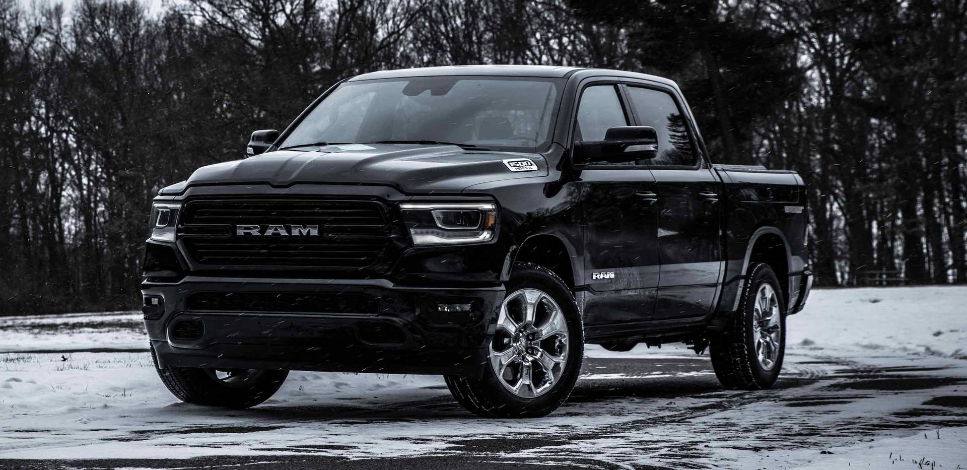 Powerful Black Ram Truck At Sunset Background