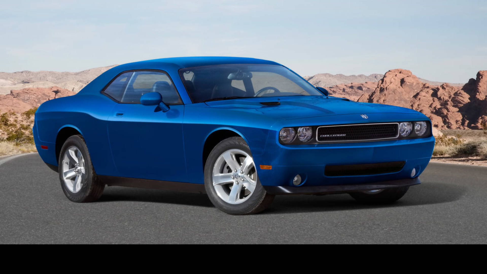 Powerful Blue Dodge Challenger In A Dynamic Pose Background