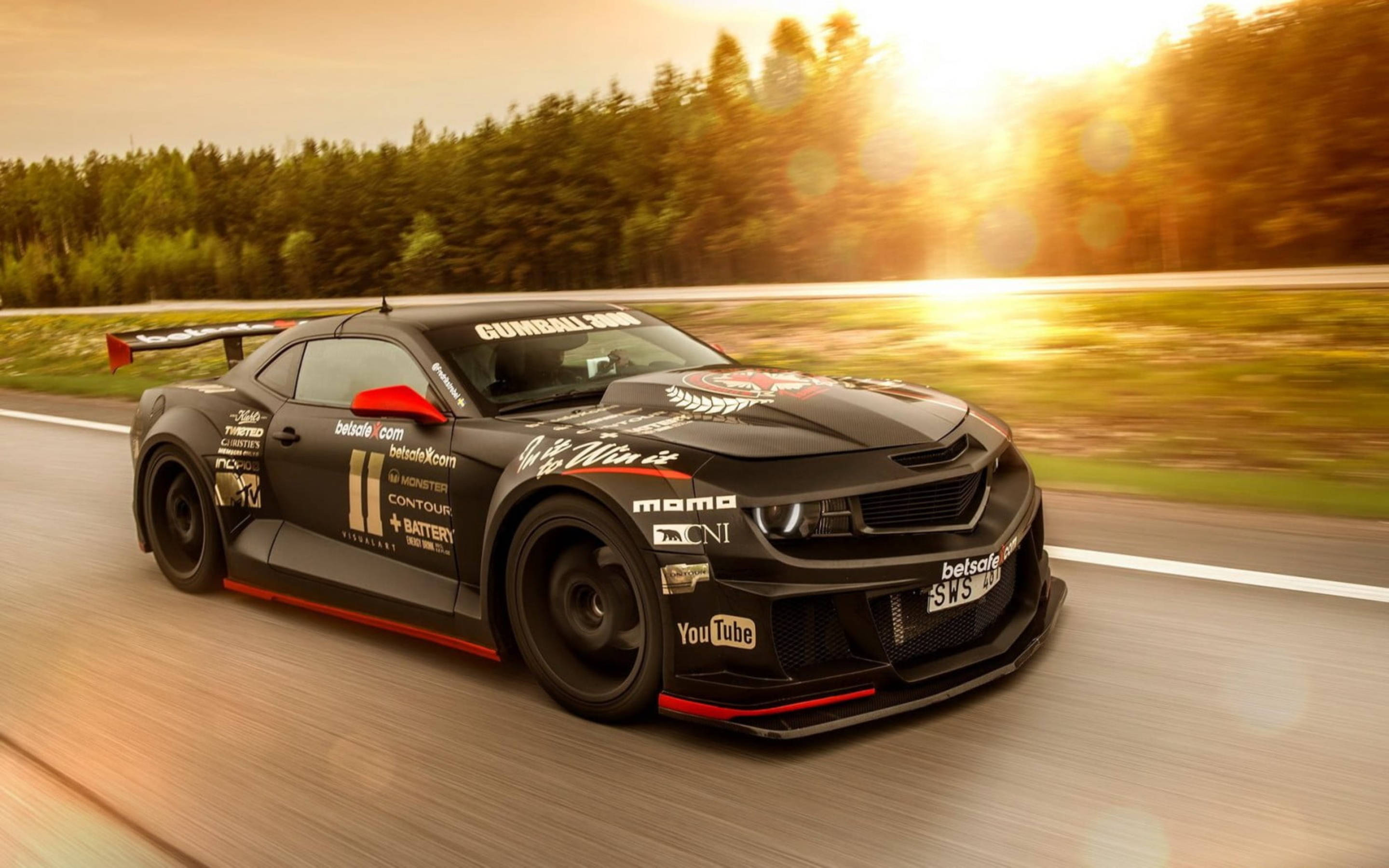 Powerful Camaro Muscle Car In Action Background