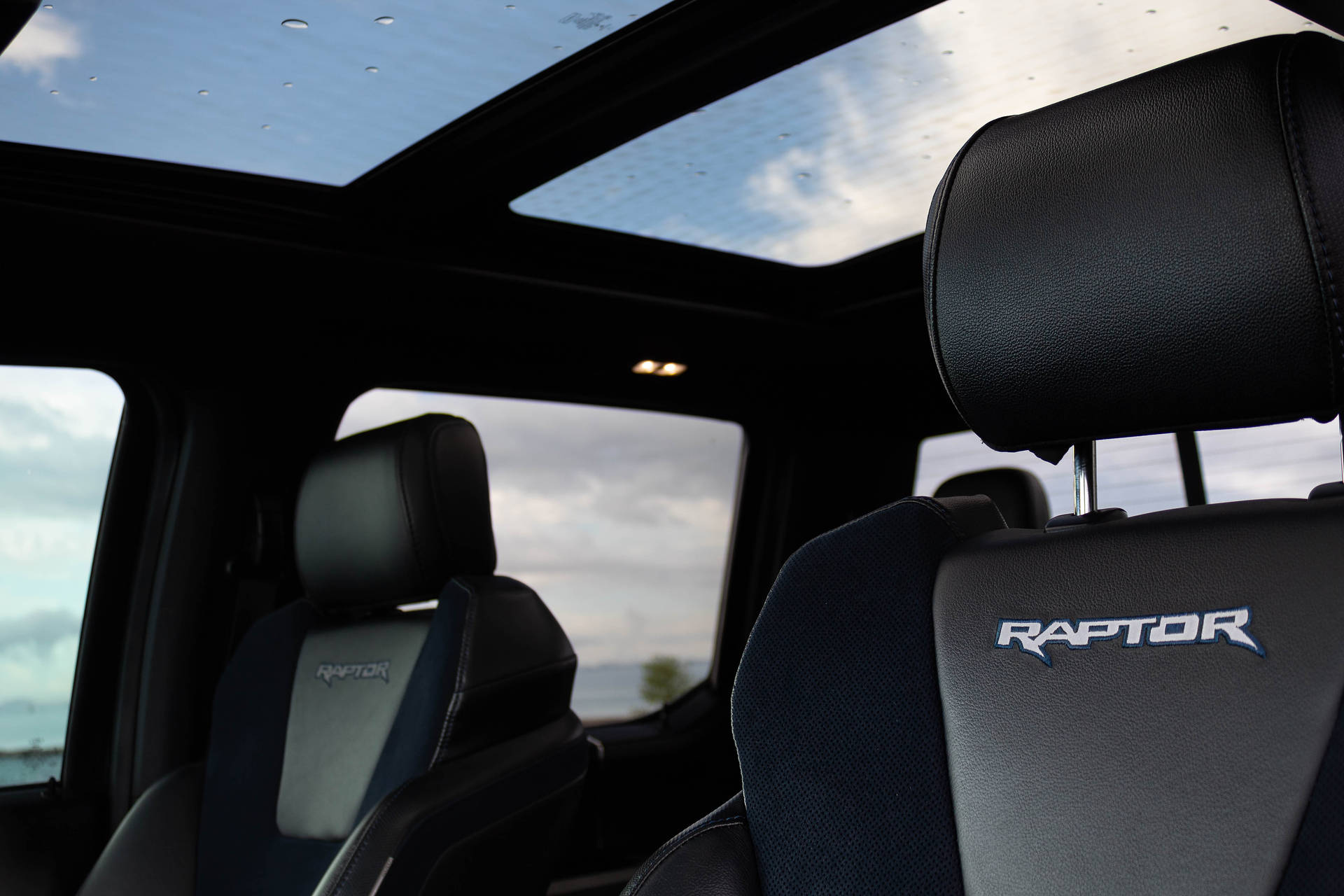Powerful Ford Raptor With Panoramic Sunroof Background