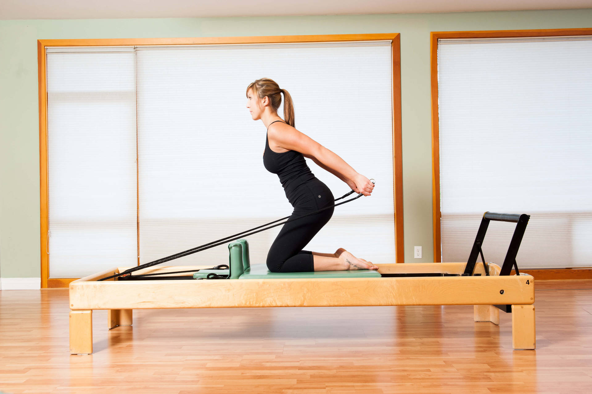 Powerful Lady Practicing Pilates Background