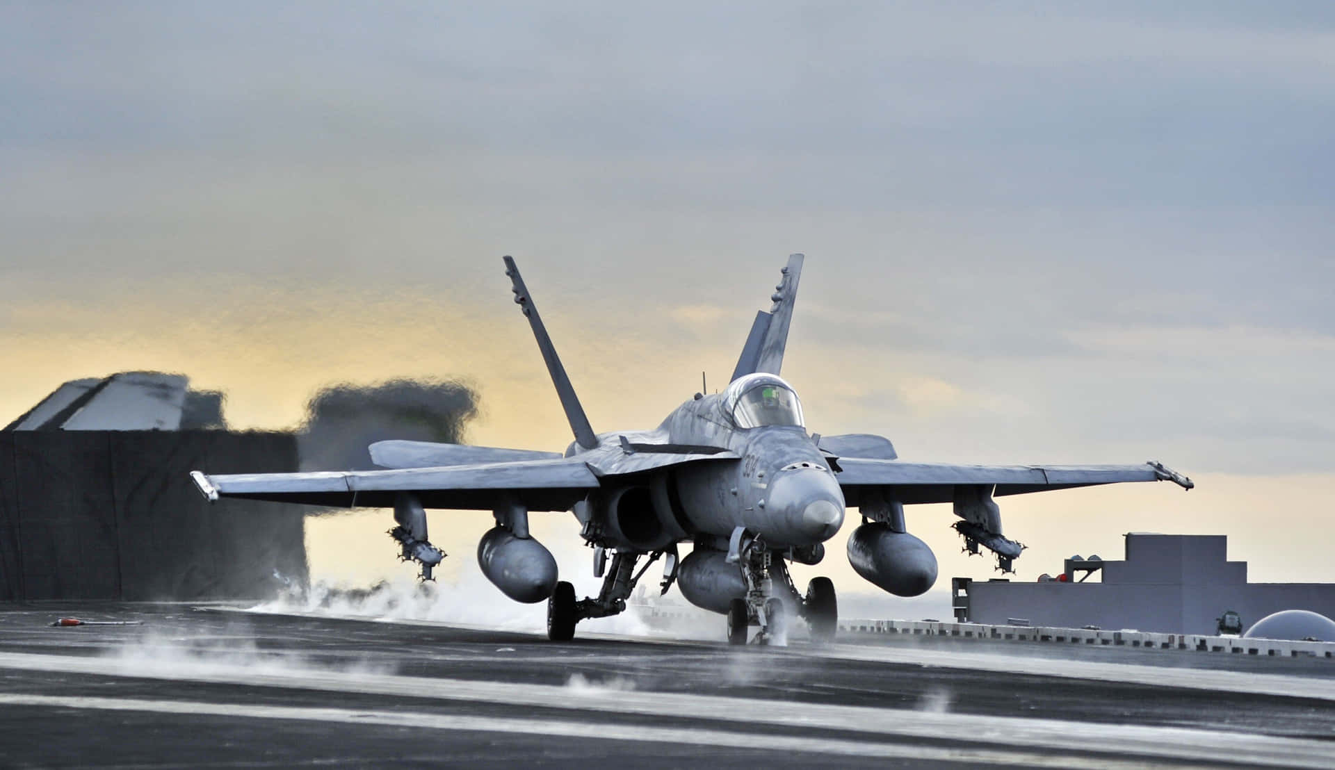 Powerful Military Plane Cruising Through The Skies Background