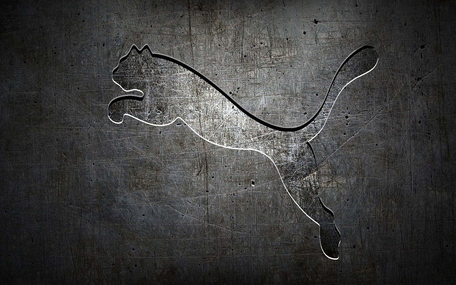 Powerful Puma Logo - A Reflection Of Energetic Sporty Essence Background