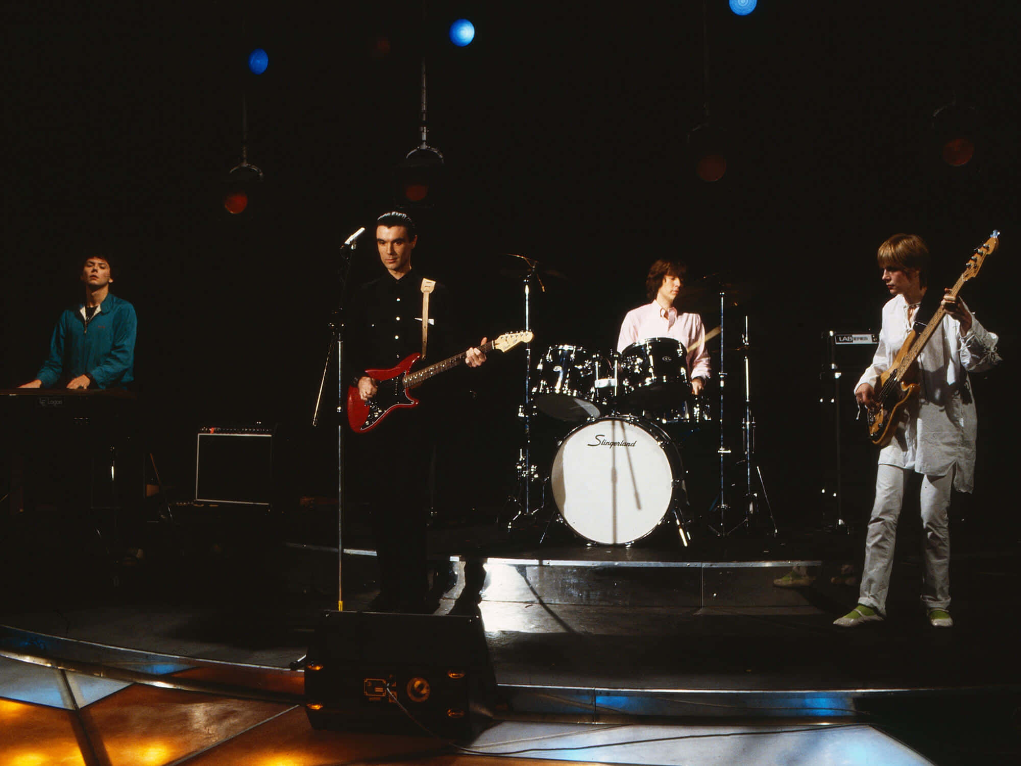 Powerful Talking Heads On Stage Performances Background