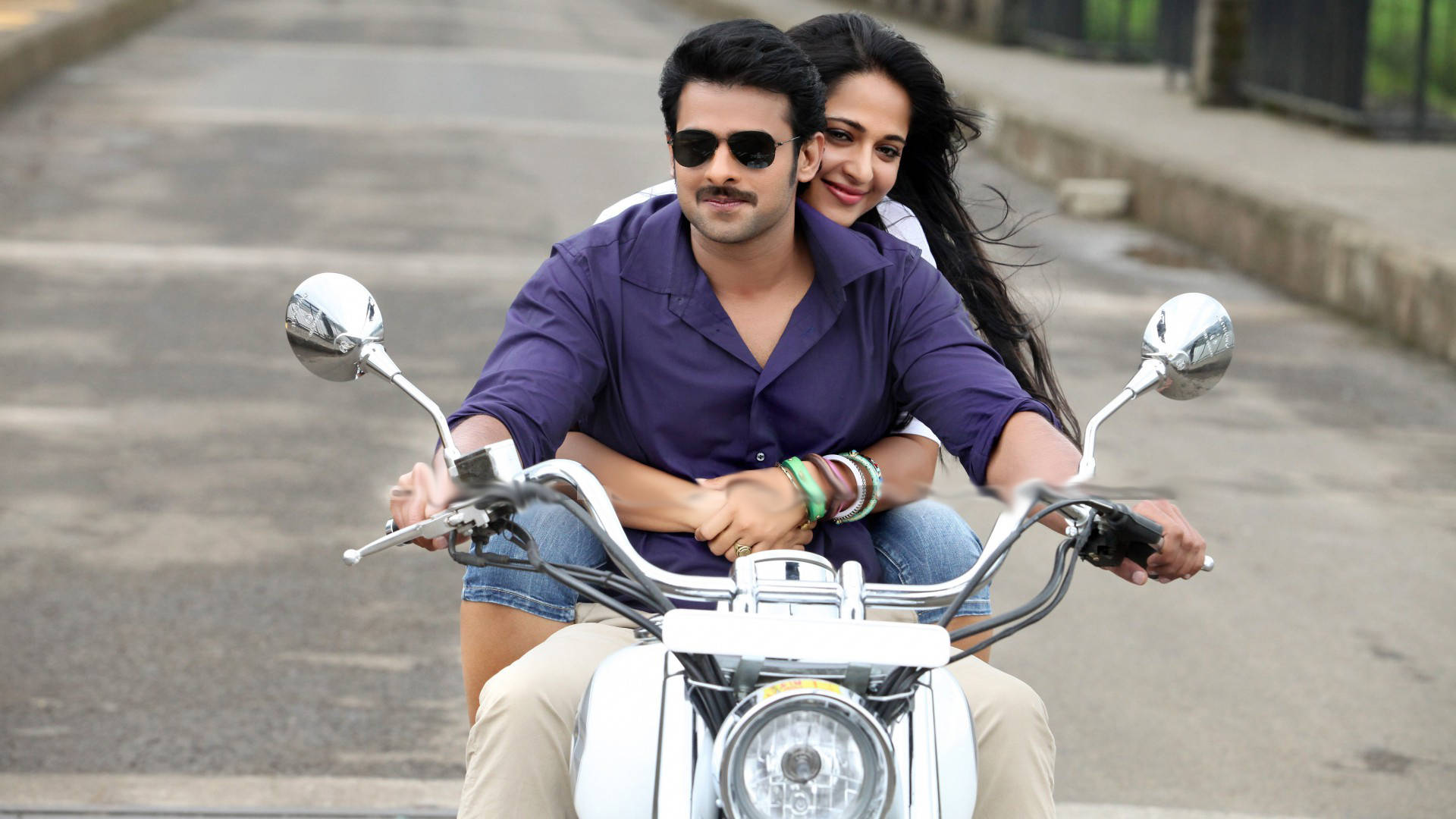 Prabhas Hd Driving With A Woman Background