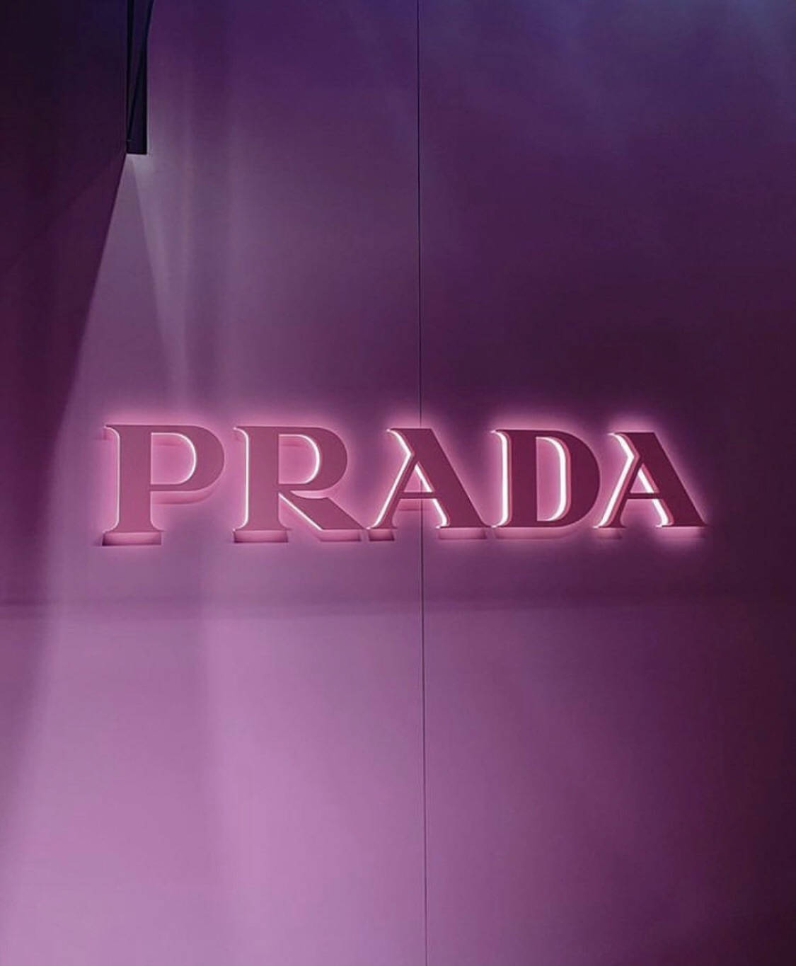 Prada's Purple Designer Logo Display Background