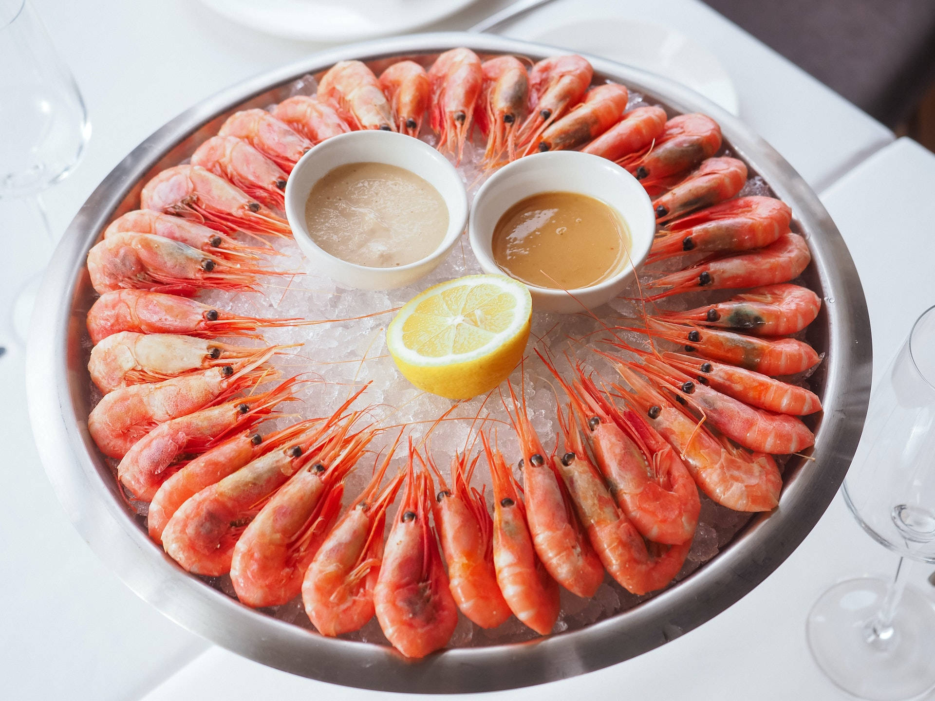 Prawns Freshly Served On Iced Platter Background