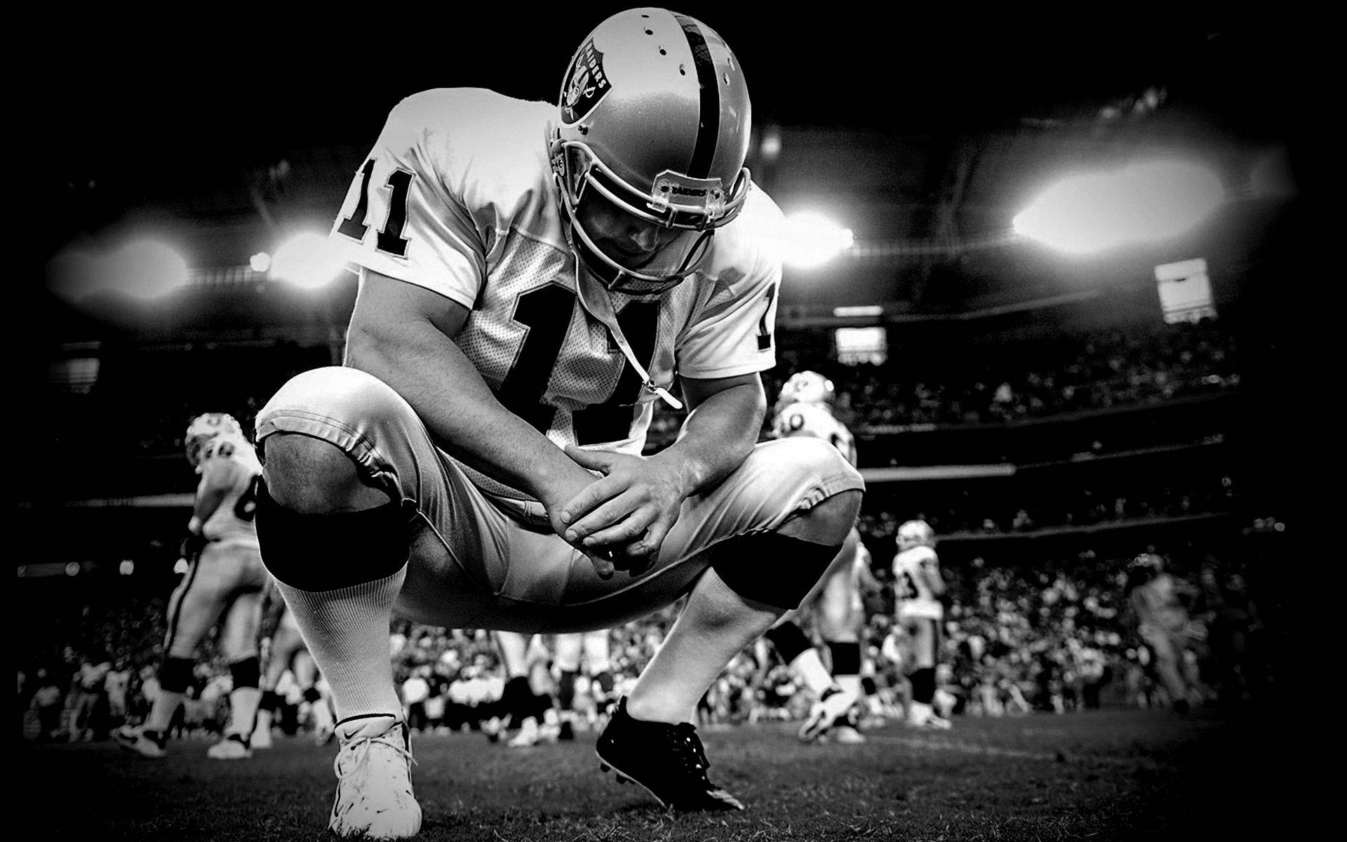 Praying Oakland Raiders Player Background