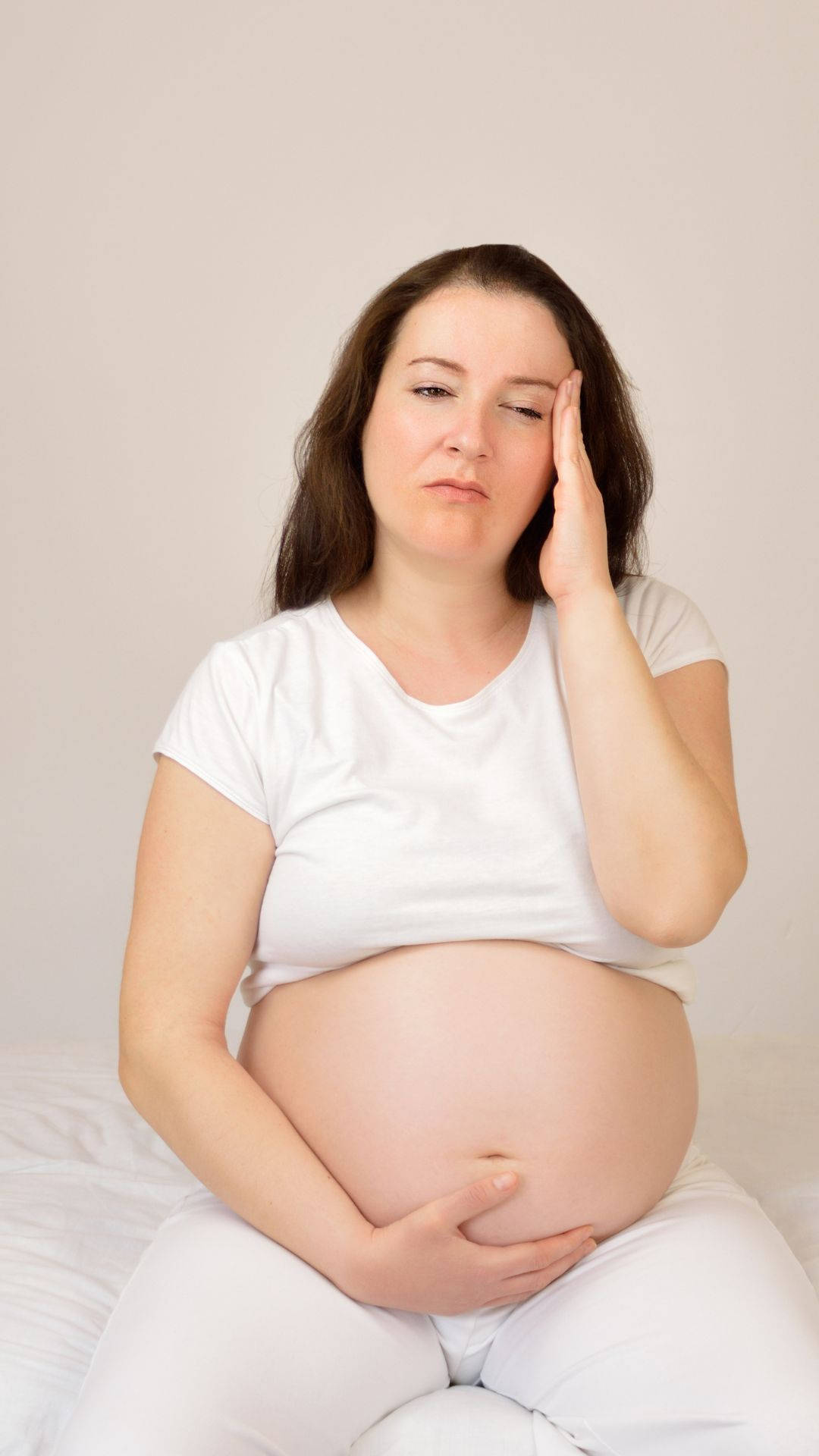 Pregnancy Woman Holding Head Background