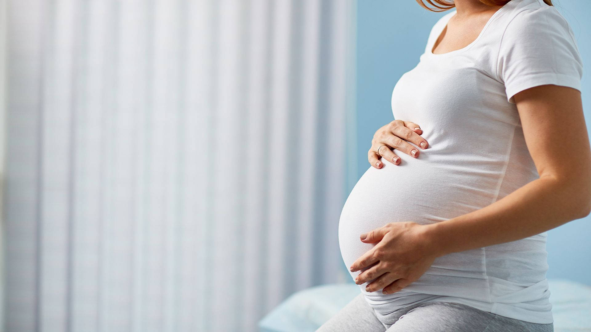 Pregnant Belly Mother In Bedroom Background