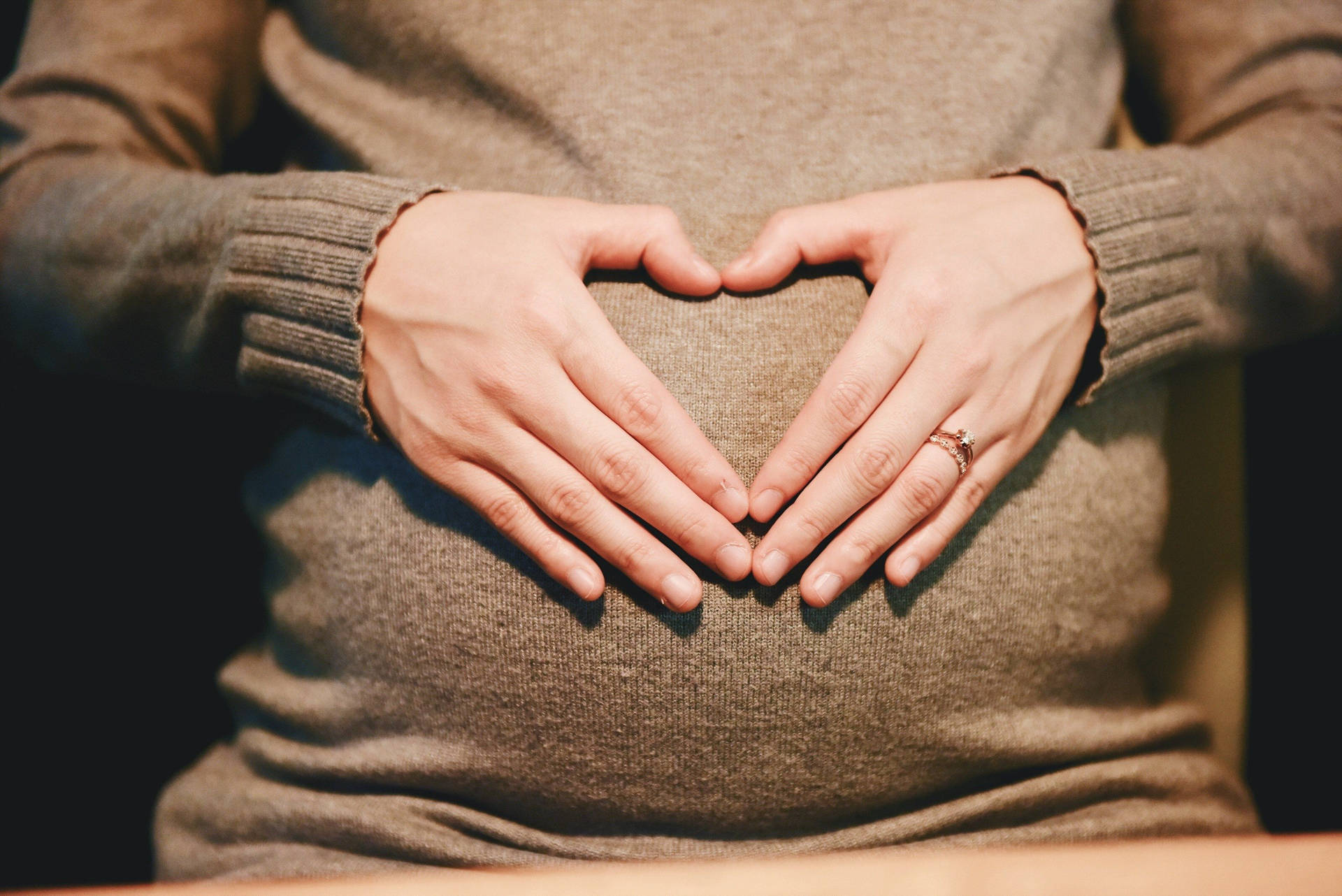 Pregnant Heart Hand Symbol Background