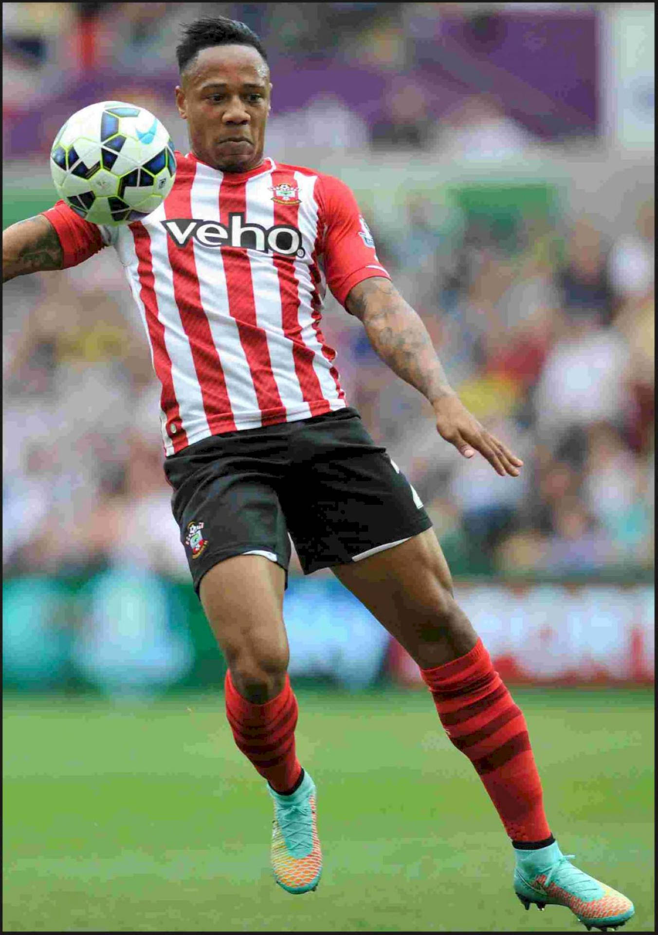 Premier League Star Nathaniel Clyne In Action Background