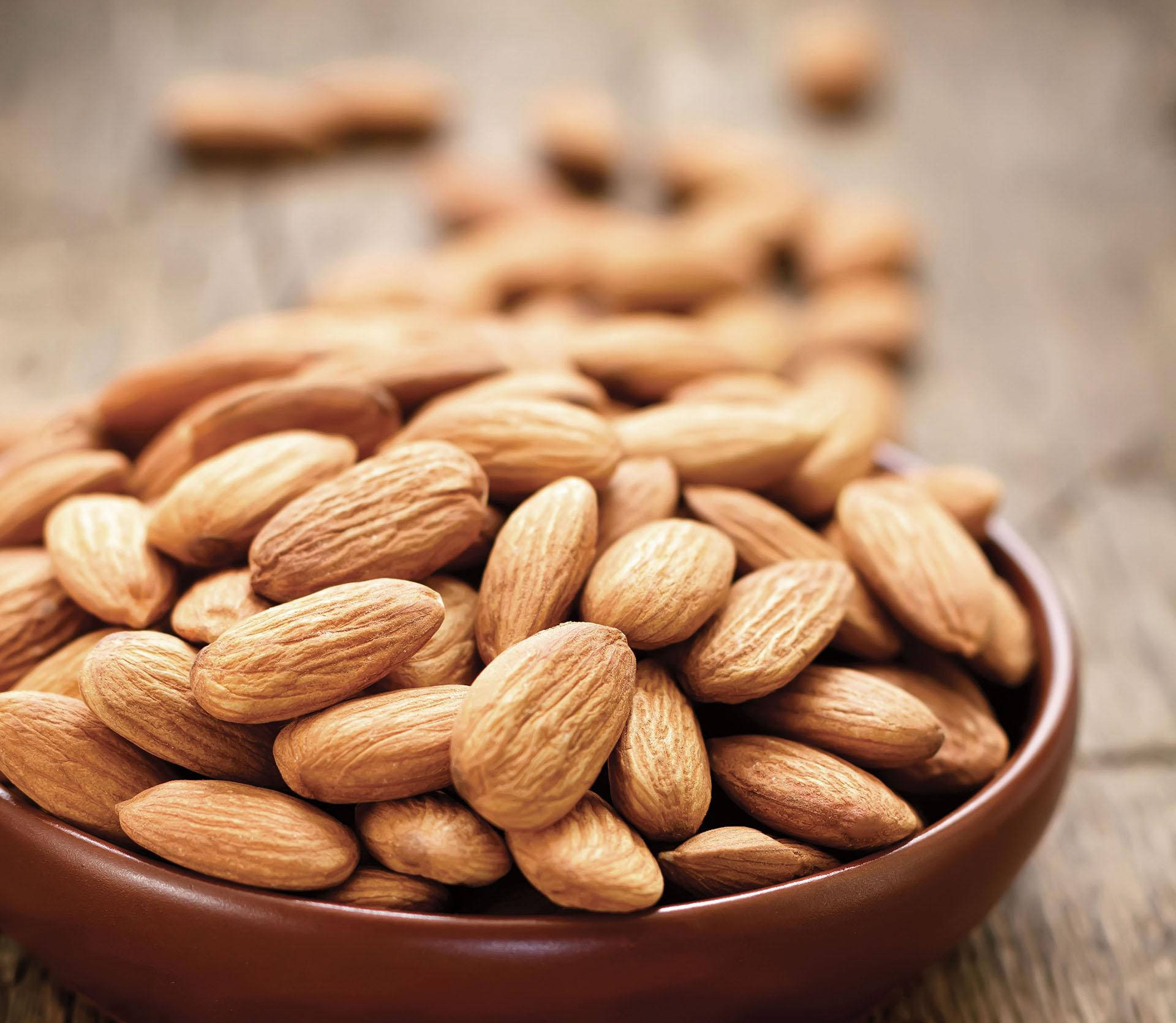 Premium Almond Nuts Background