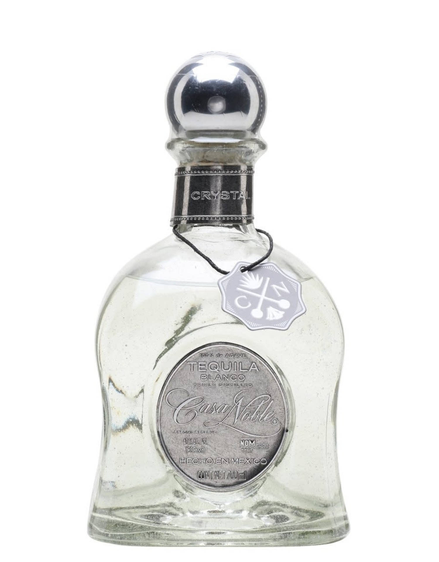 Premium Casa Noble Crystal Blanco Tequila In Vintage Bottle Background