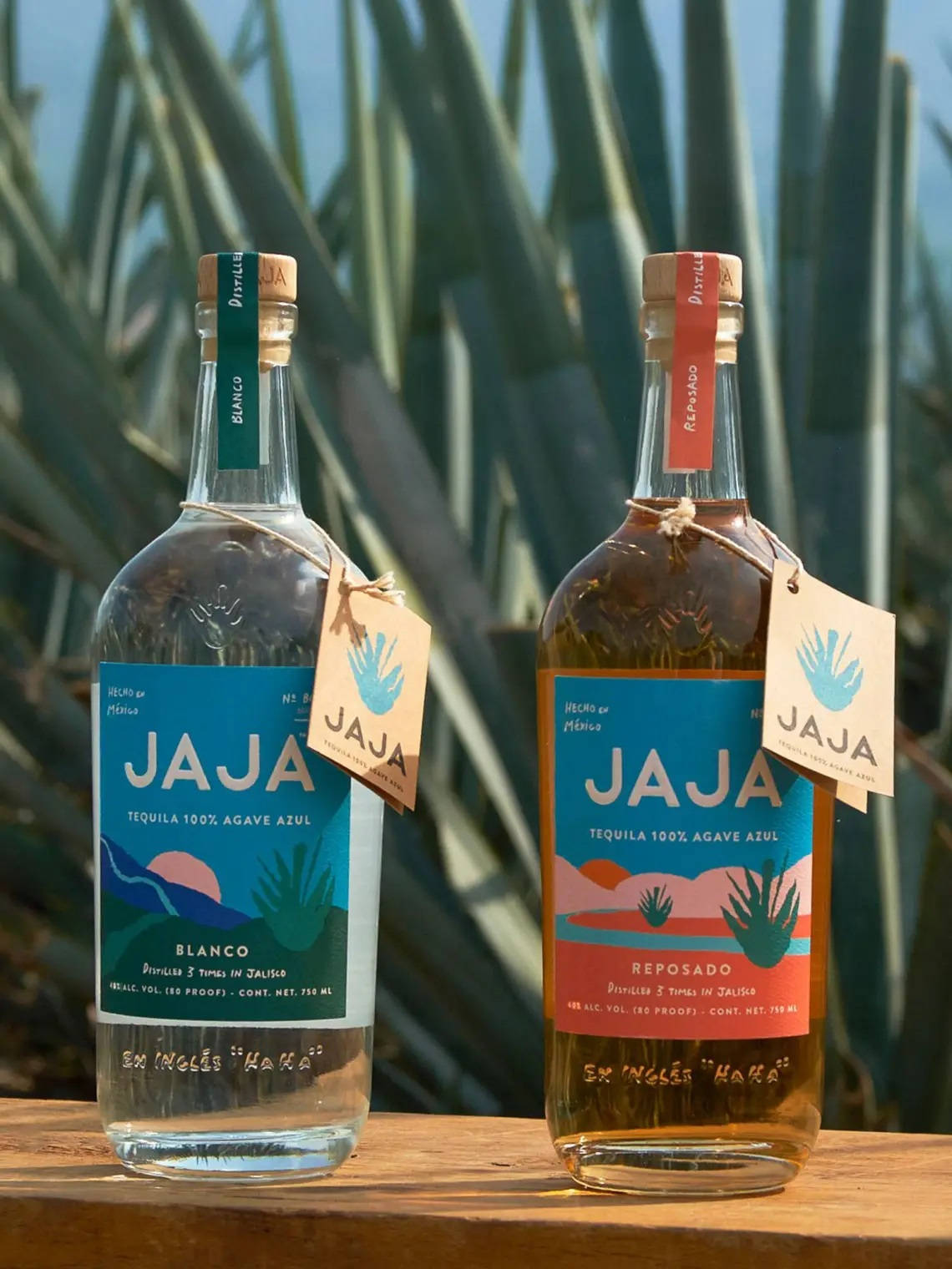 Premium Jaja Tequila Blanco And Reposado Bottles Background