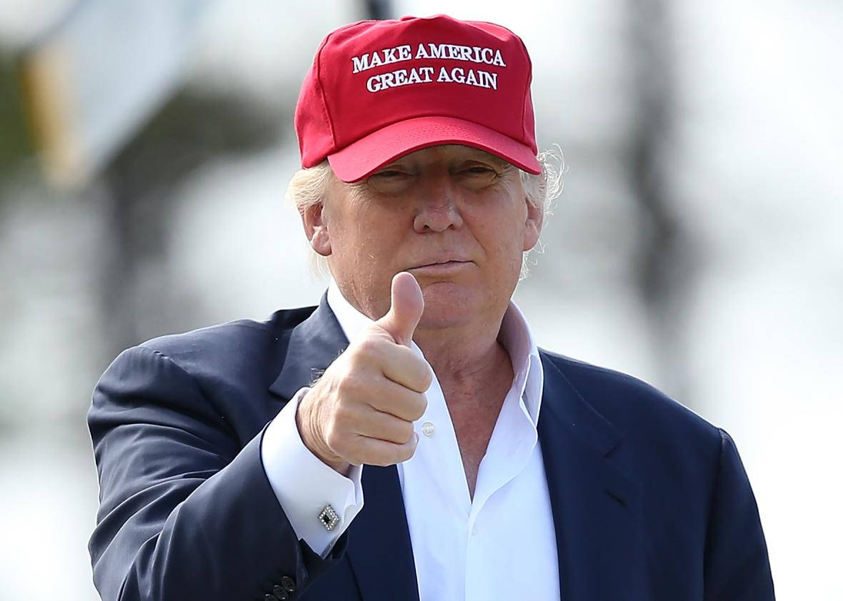President Trump Thumbs Up In Red Cap Background